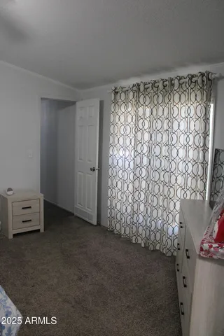 a view of hallway with washer and dryer