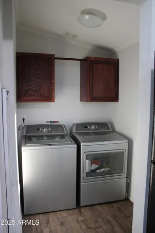 a stove top oven sitting inside of a kitchen