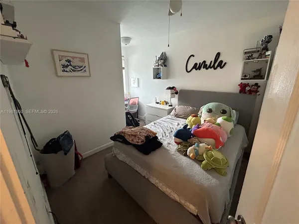 a bedroom with furniture and a couch