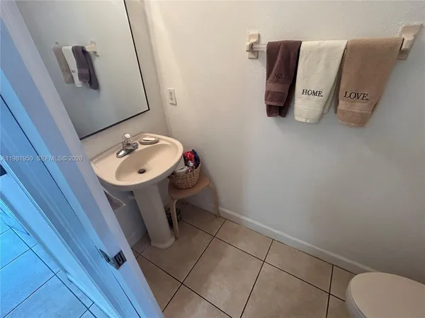 a bathroom with a toilet and sink