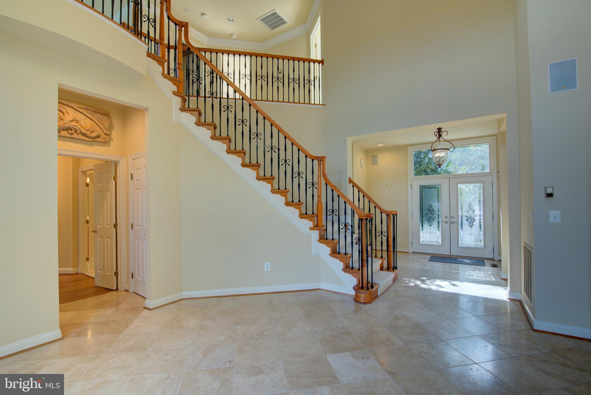 43462 Firestone Place Leesburg, VA 20176 - Photo 20 of 80 a view of an entryway with wooden floor