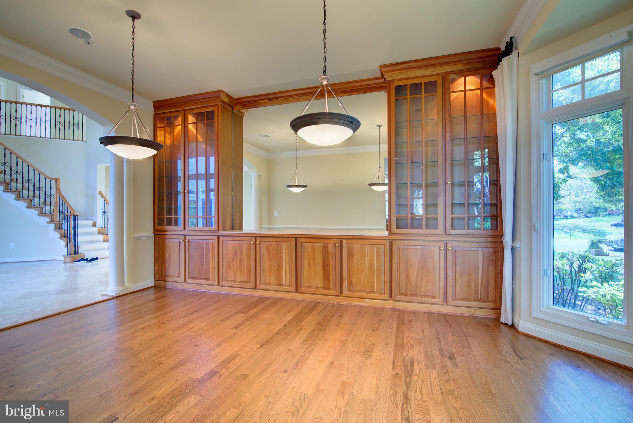 43462 Firestone Place Leesburg, VA 20176 - Photo 24 of 80 a view of a room with wooden floor and windows