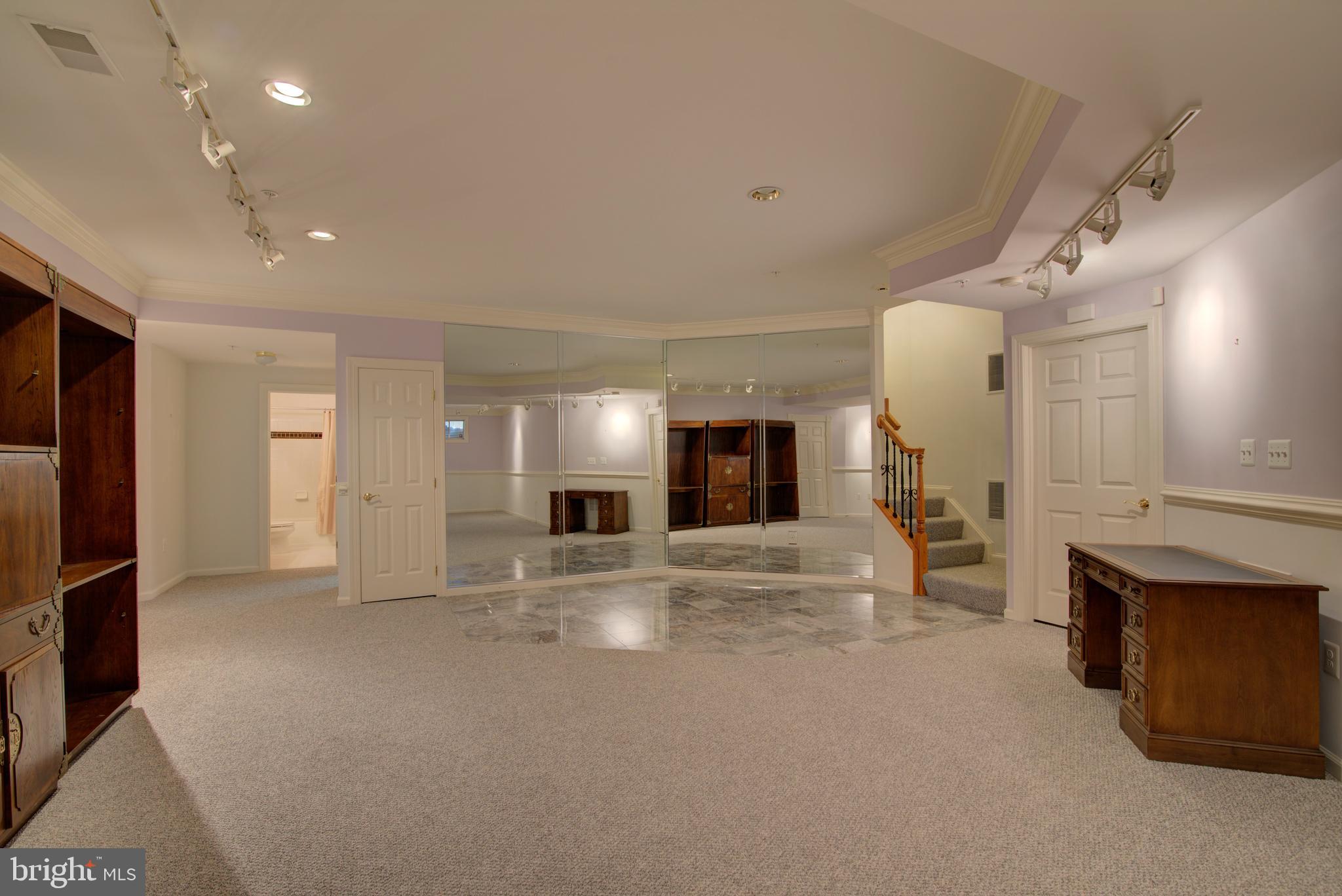 43462 Firestone Place Leesburg, VA 20176 - Photo 43 of 80 a view of empty room with kitchen and window