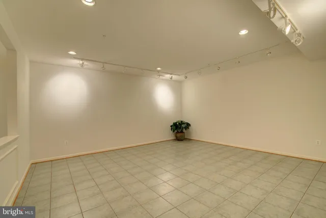 a view of a backyard with sitting area