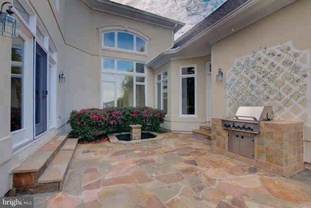 a view of a lake with houses in the background