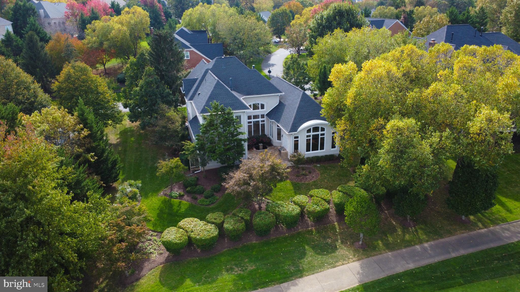 43462 Firestone Place Leesburg, VA 20176 - Photo 5 of 80 a aerial view of a house with a yard basket ball court and outdoor seating