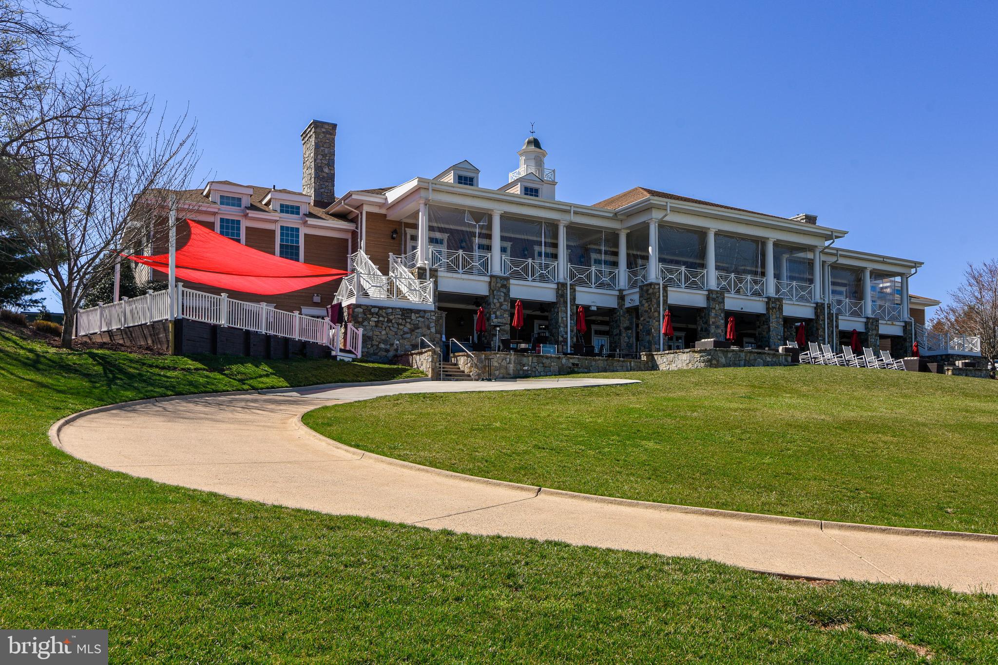 43462 Firestone Place Leesburg, VA 20176 - Photo 60 of 80 a front view of a house with a garden