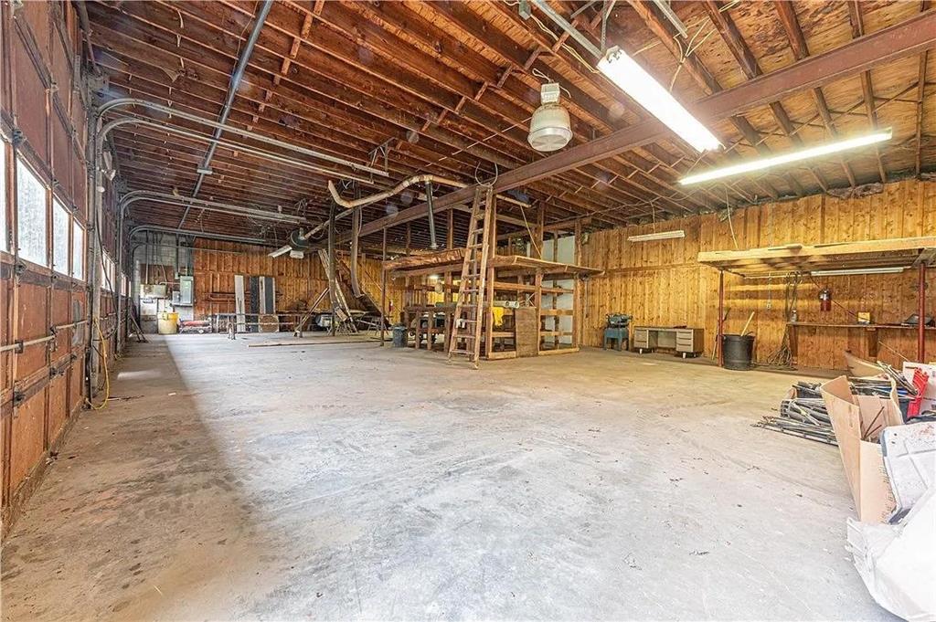 22 Buzzardtown Road Irwin, PA 15642 - Photo 37 of 44 a view of a garage with wooden floor