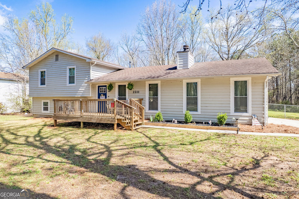 2211 Sharpsburg McCollum Road Newnan, GA 30265 - Photo 1 of 1 a house view with a sitting space