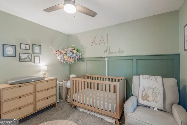 a bedroom with furniture and a chandelier