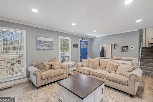 a living room with furniture and a couch
