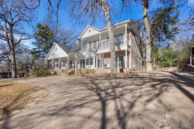 a view of a building with a yard