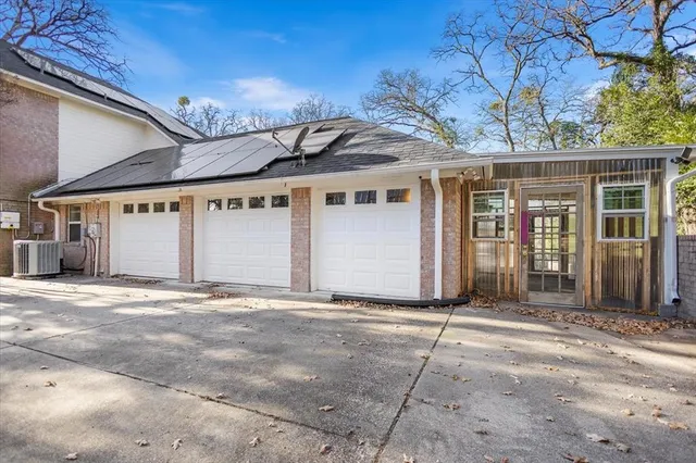 a view of a house with a snow in the yard