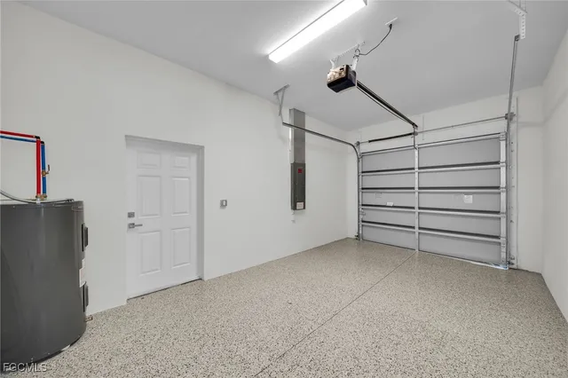 a view of room that has a white walls