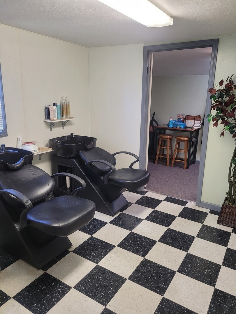105 18th Street Mount Vernon, IL 62864 - Photo 11 of 16 a living room with a black white checkered floor