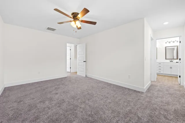 a bathroom with a sink and shower