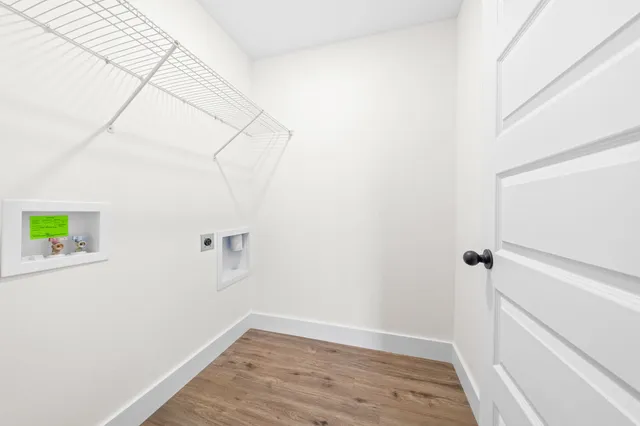 a view of a balcony with wooden floor