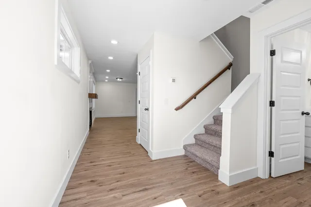 a view of entryway with wooden floor