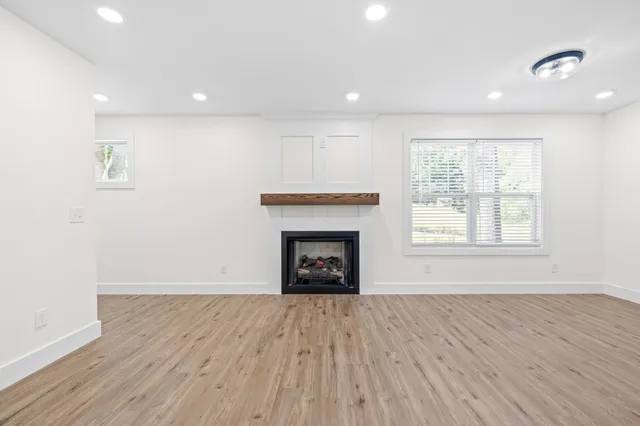 a view of kitchen with wooden floor