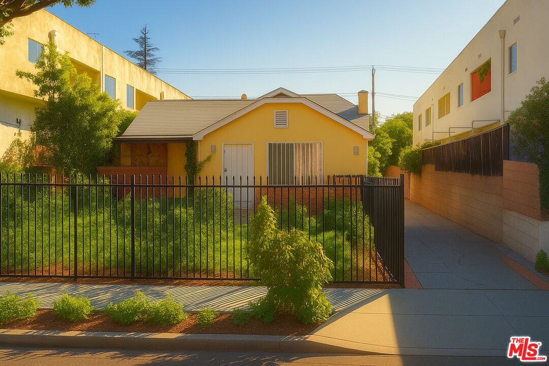 a view of a bird door of the house and a street
