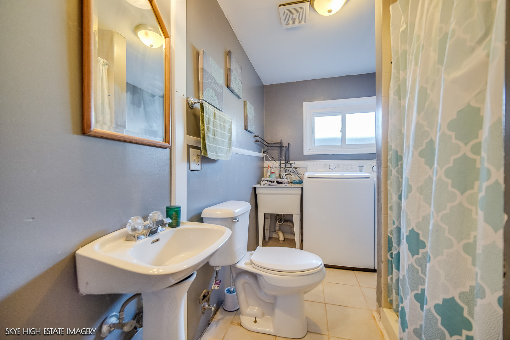 113 April Lane North Aurora, IL 60542 - Photo 12 of 23 a bathroom with a sink a toilet and mirror