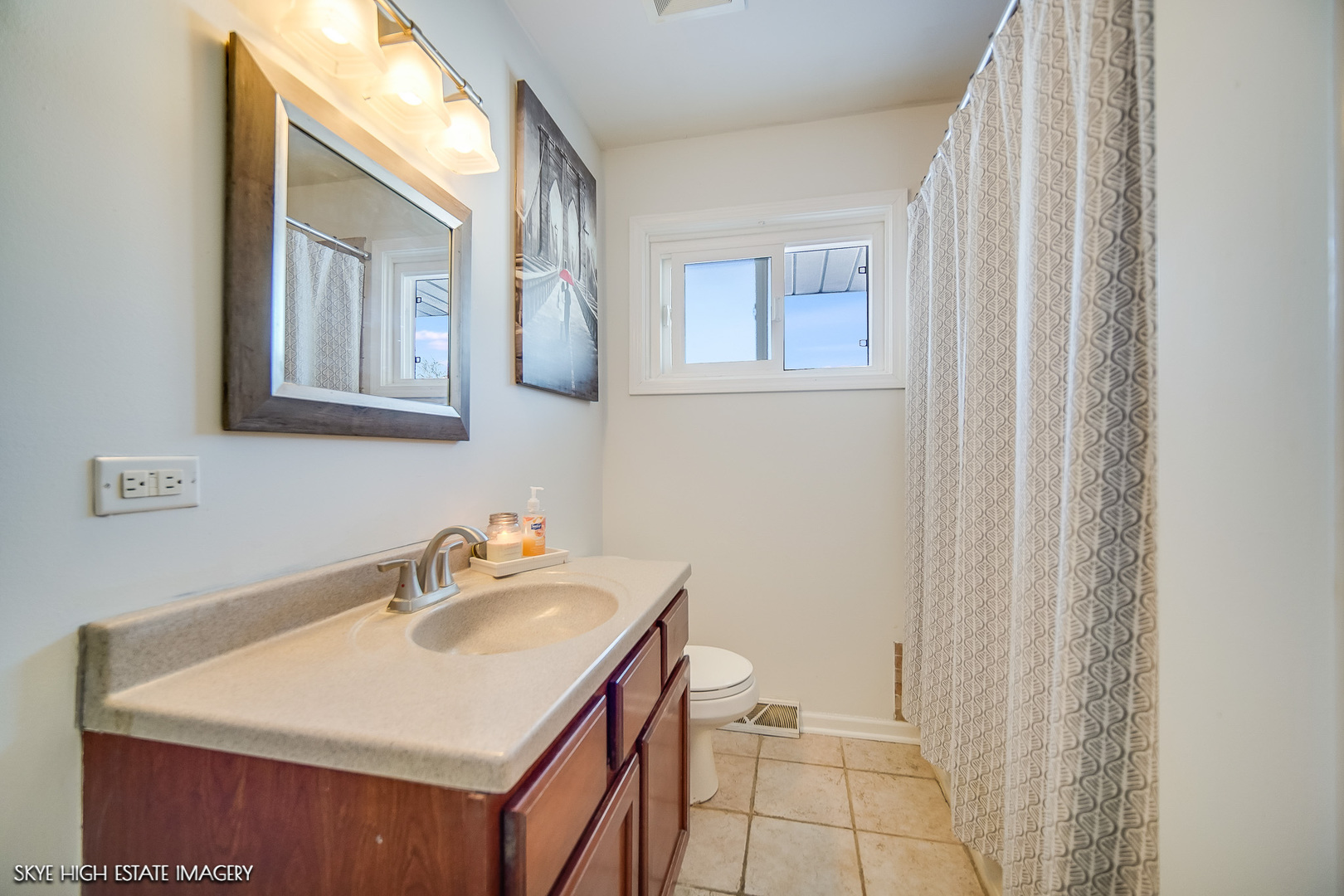 113 April Lane North Aurora, IL 60542 - Photo 15 of 23 a bathroom with a sink vanity and a mirror