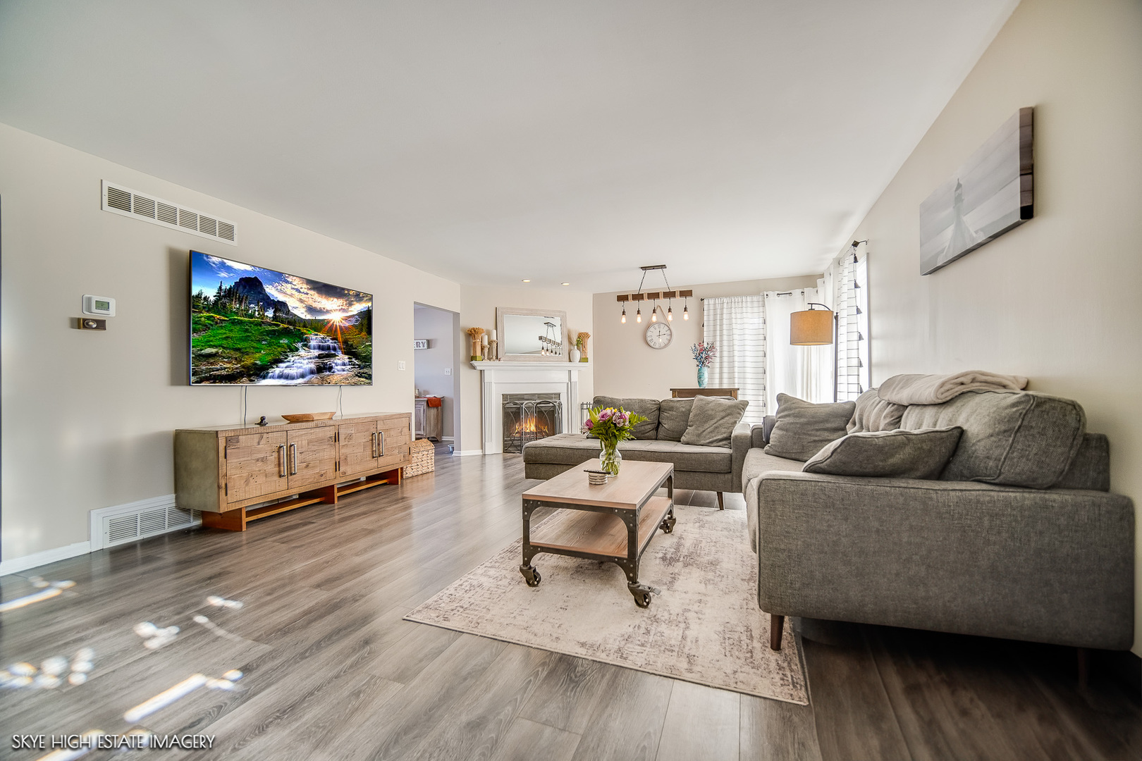 113 April Lane North Aurora, IL 60542 - Photo 6 of 23 a living room with furniture and a flat screen tv
