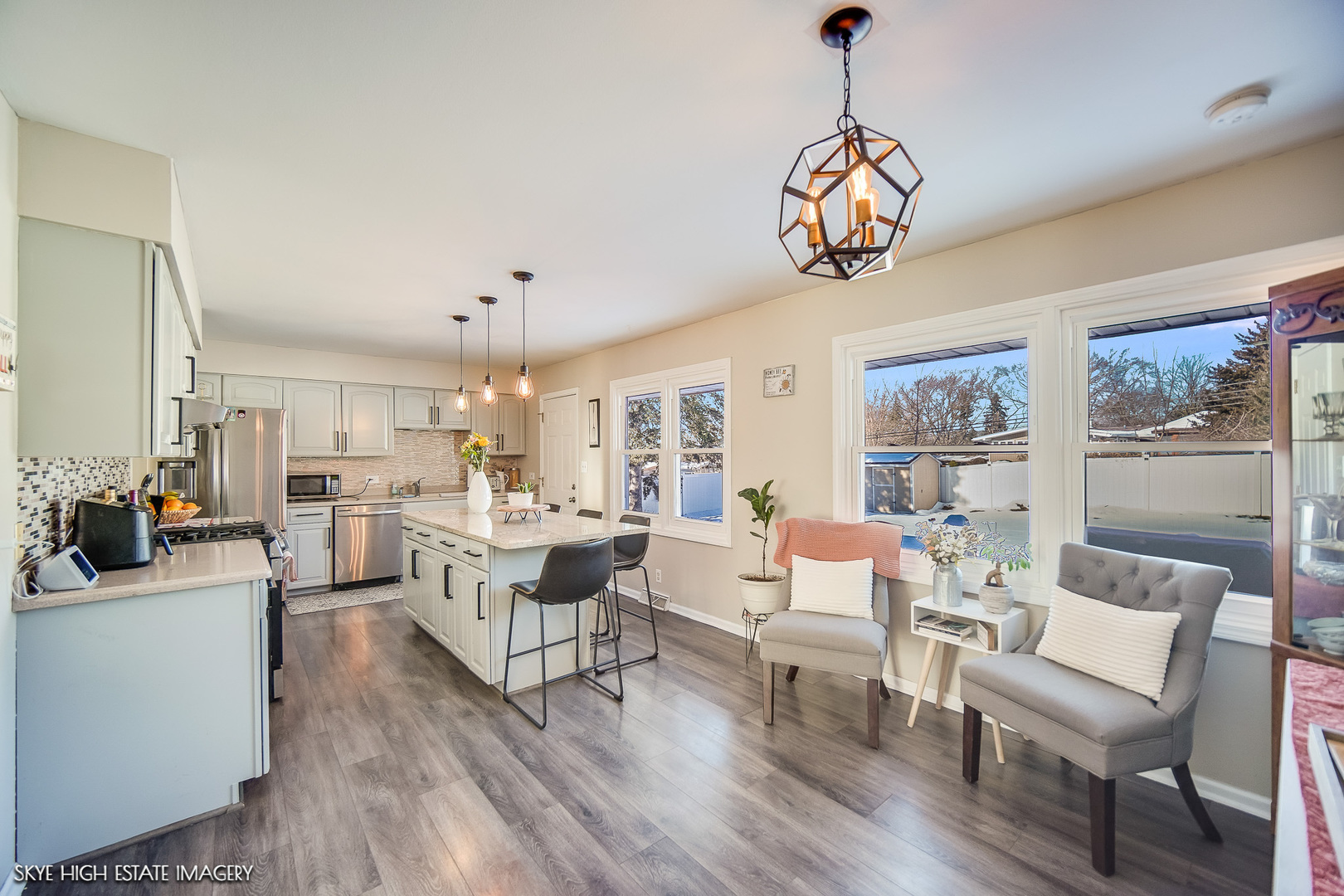 113 April Lane North Aurora, IL 60542 - Photo 8 of 23 a view of a dining room with furniture window and wooden floor