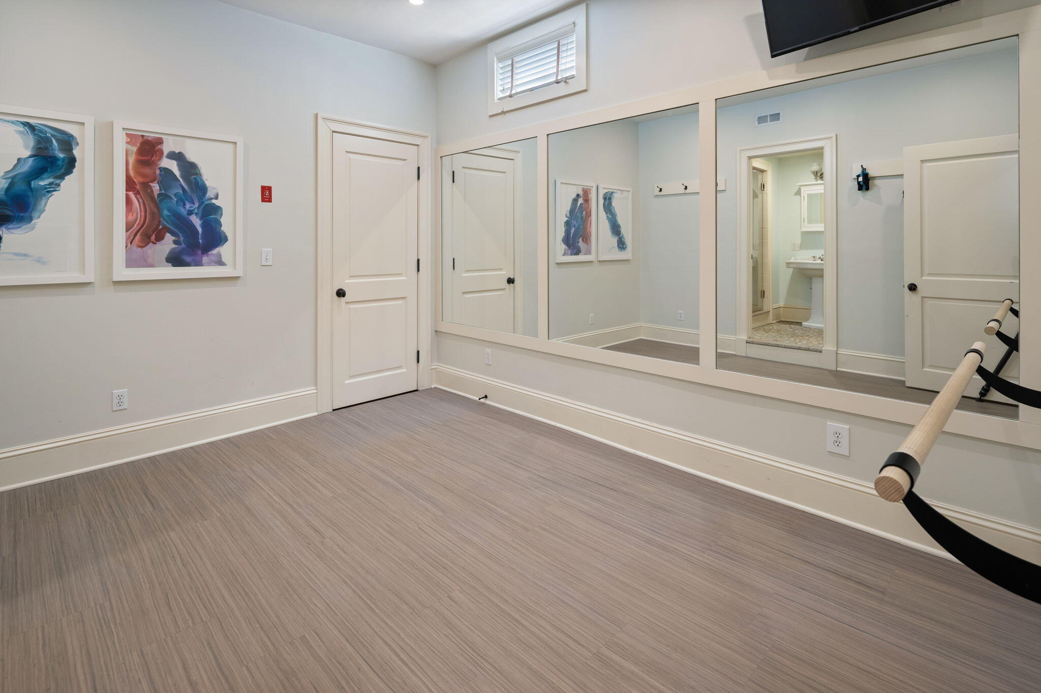 1578 Ponus Ridge Road New Canaan, CT 06840 - Photo 47 of 70 a view of a livingroom with wooden floor and furniture