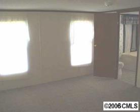 860 Mclendon Road Morven, NC 28119 - Photo 4 of 4 a view of an empty room and a window