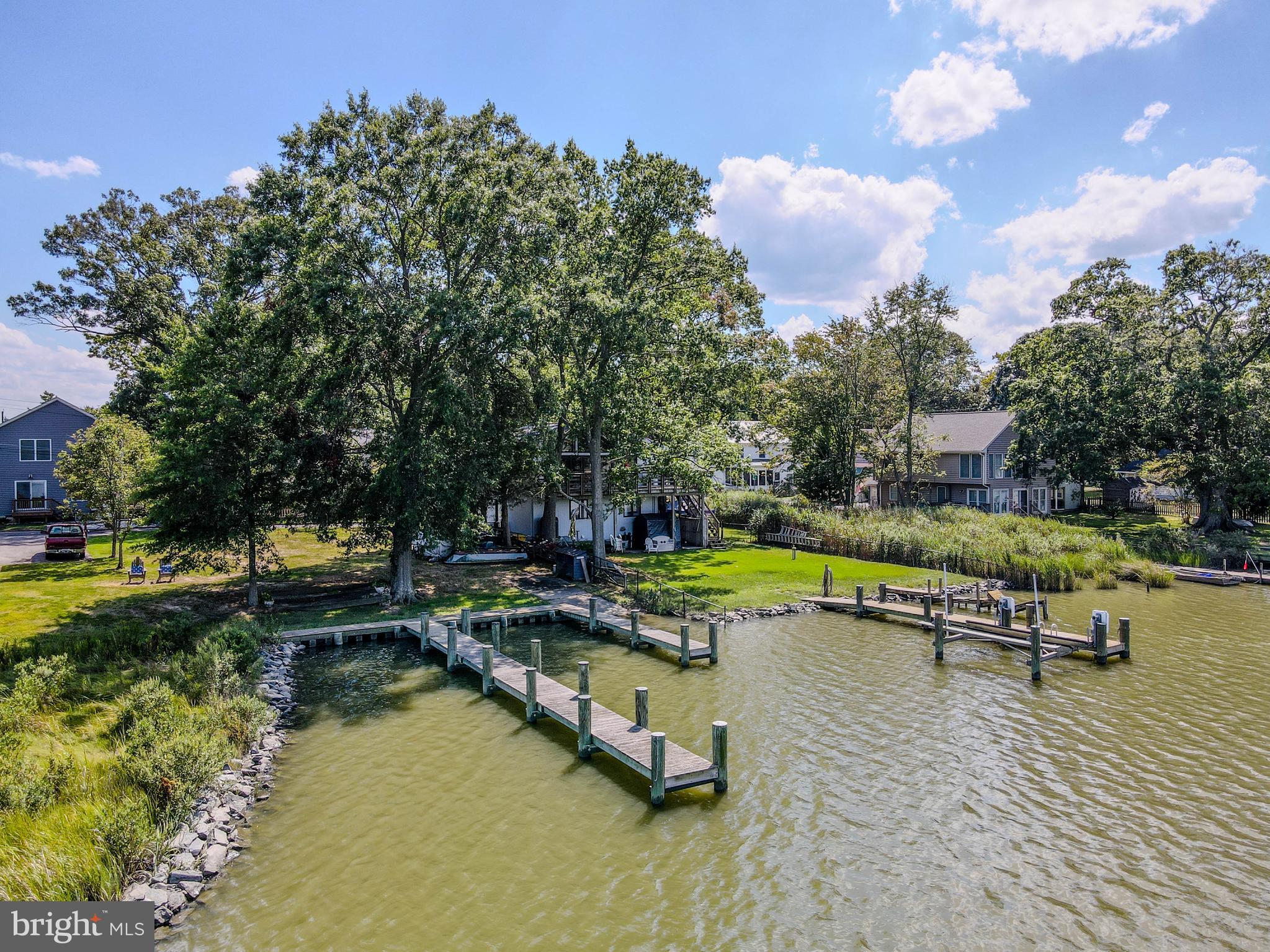964 Main Street Deale, MD 20751 - Photo 6 of 14 a view of a swimming pool with lounge chairs