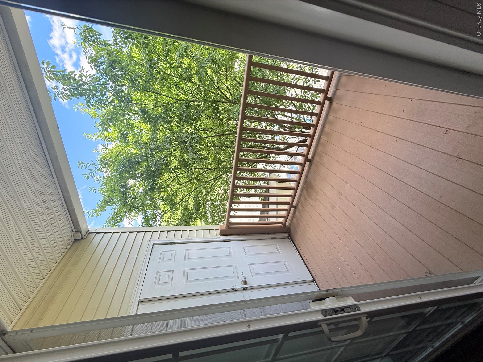 935 Tower Ridge Circle Middletown, NY 10941 - Photo 21 of 24 Private balcony with composite decking and wood railing