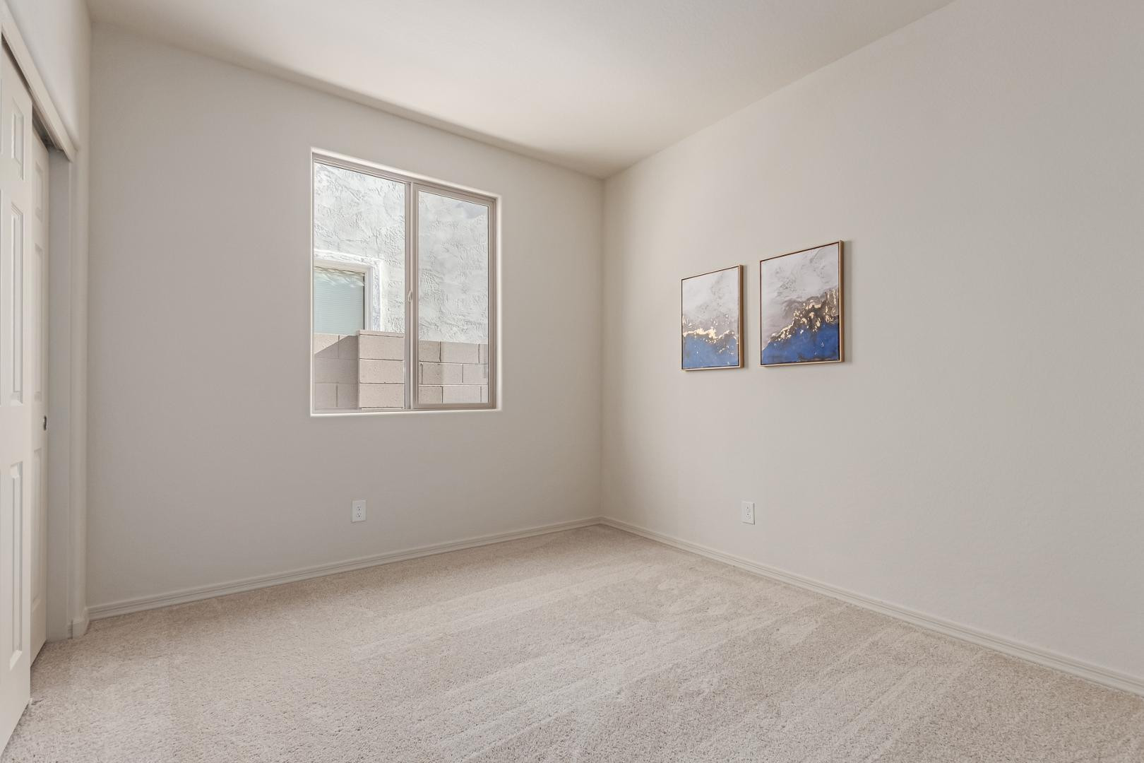 7143 West Coles Road Laveen, AZ 85339 - Photo 10 of 15 an empty room with windows