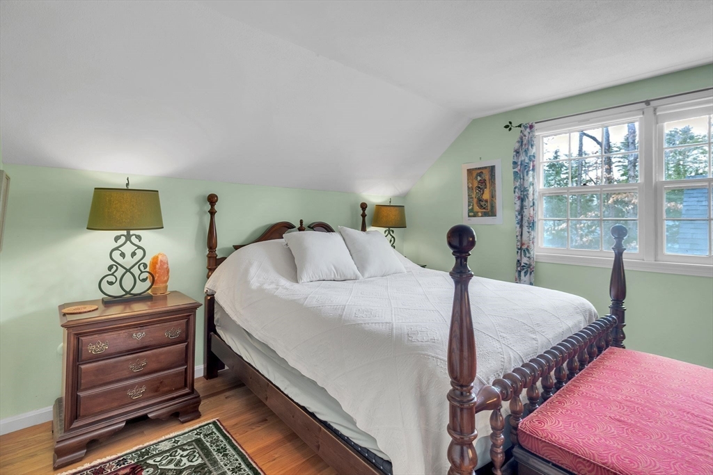 64 Heatherstone Road Amherst, MA 01002 - Photo 21 of 42 a bedroom with a bed and a window