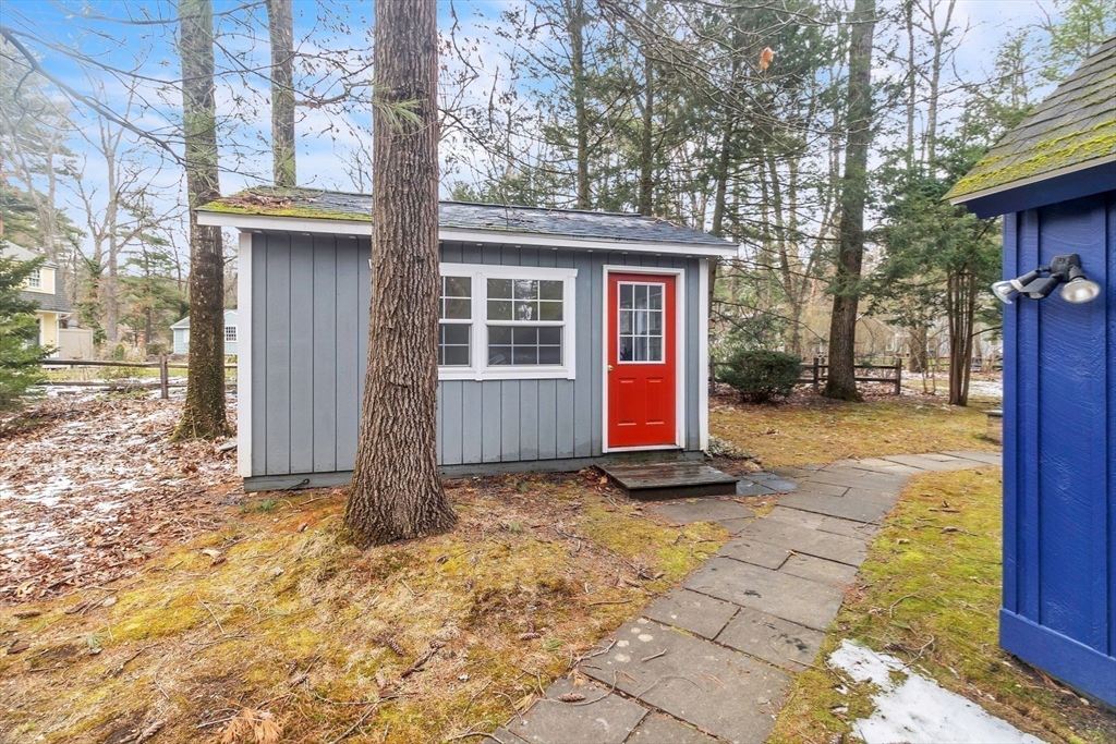 64 Heatherstone Road Amherst, MA 01002 - Photo 34 of 42 a view of a house with backyard and tree