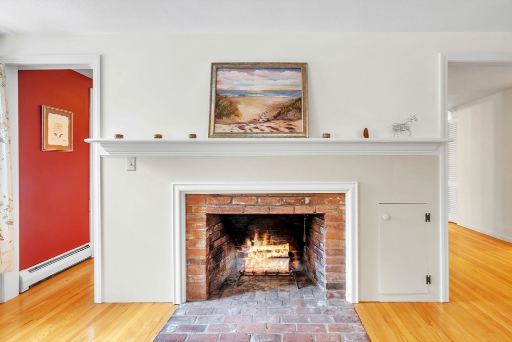 64 Heatherstone Road Amherst, MA 01002 - Photo 7 of 42 a view of a livingroom with a fireplace