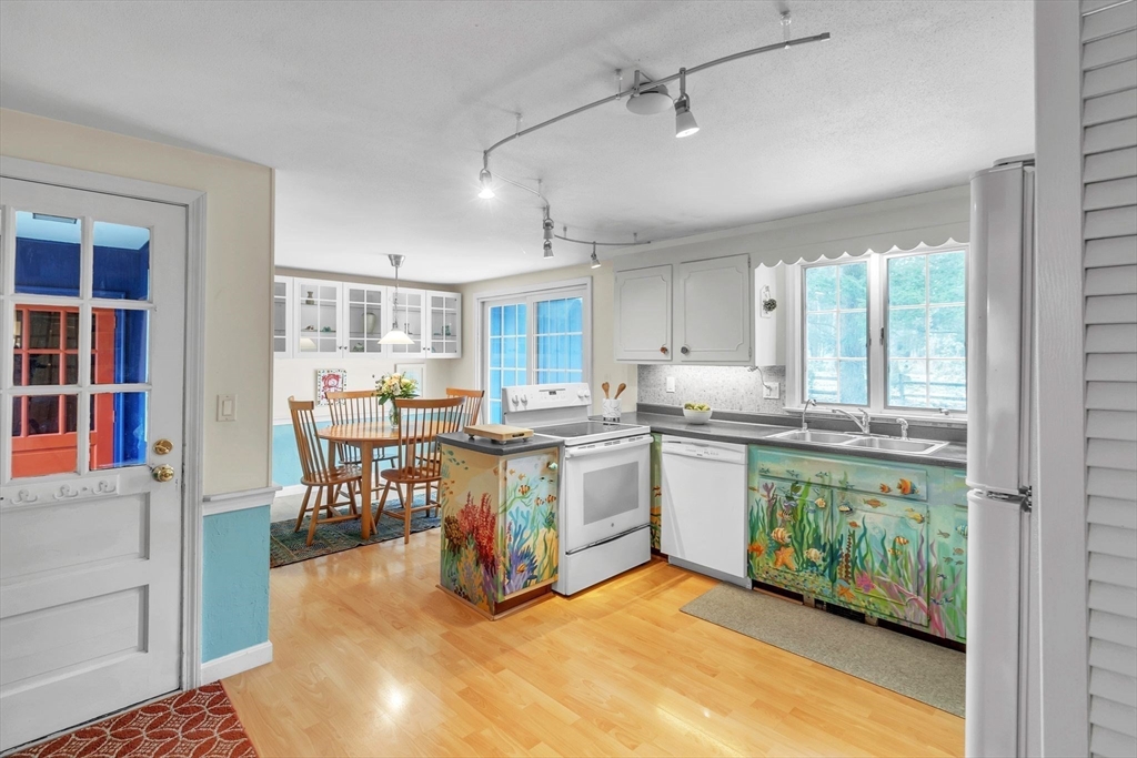 64 Heatherstone Road Amherst, MA 01002 - Photo 10 of 42 a kitchen with stove and cabinets
