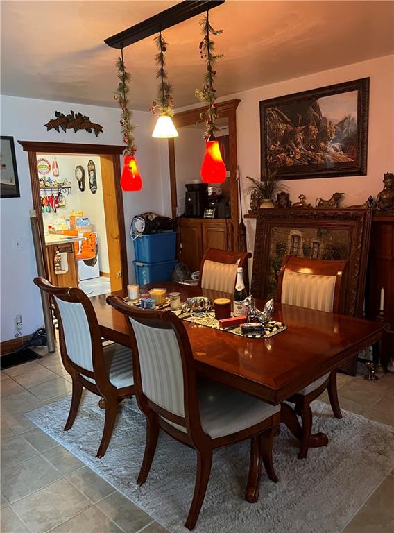 1008 Main Street East Rural Valley, PA 16249 - Photo 14 of 24 a view of a dining room with furniture and chandelier
