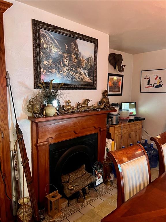 1008 Main Street East Rural Valley, PA 16249 - Photo 16 of 24 a living room with furniture and a fireplace