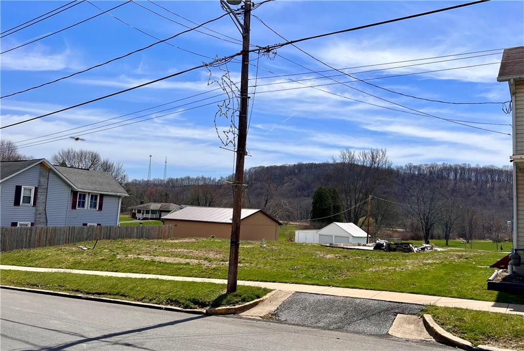 1008 Main Street East Rural Valley, PA 16249 - Photo 4 of 24 a view of a swimming pool with a yard