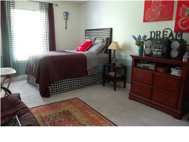660 Territory Lane Crestview, FL 32536 - Photo 13 of 15 a bedroom with a bed and with furniture
