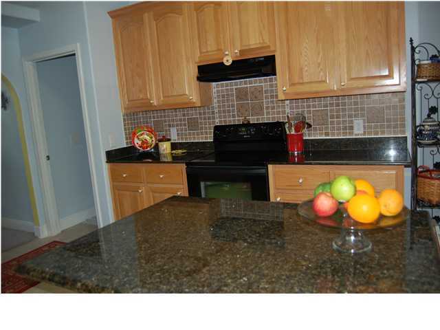 660 Territory Lane Crestview, FL 32536 - Photo 6 of 15 a kitchen with a sink and cabinets