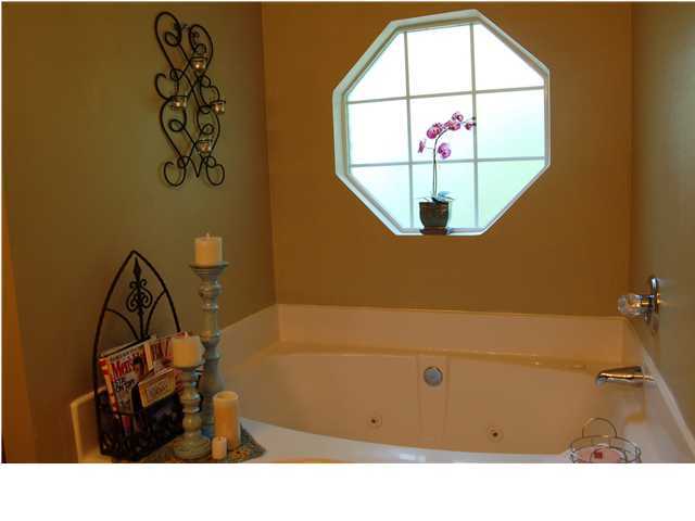 660 Territory Lane Crestview, FL 32536 - Photo 10 of 15 a bathroom with a sink and a mirror