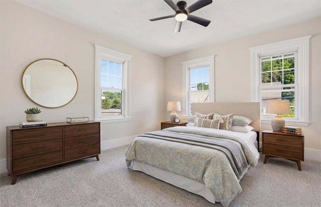 110 Messinger Street Bangor, PA 18013 - Photo 14 of 39 A well-lit bedroom features plush carpeting and multiple windows.