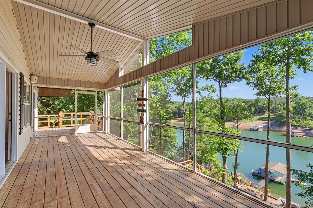 456 Deaver Cove Road Blairsville, GA 30512 - Photo 4 of 83 a view of balcony with wooden floor