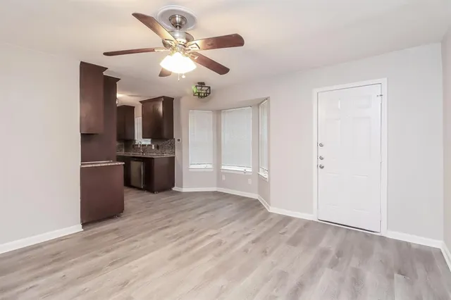 a view of kitchen with cabinets and stainless steel appliances
