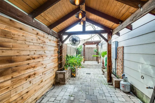 a view of a porch with a potted plant