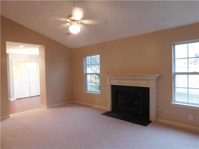 200 Old Railroad Road Prospect, TN 38477 - Photo 18 of 20 a living room with furniture and a fireplace