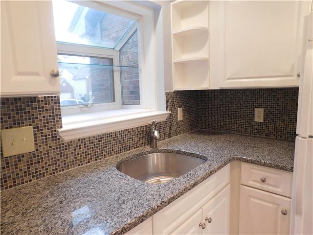 200 Old Railroad Road Prospect, TN 38477 - Photo 19 of 20 a kitchen with a sink and cabinets