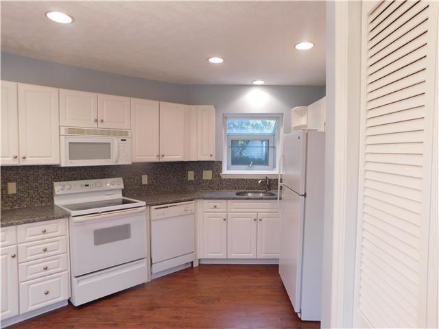 200 Old Railroad Road Prospect, TN 38477 - Photo 20 of 20 a kitchen with white cabinets and sink